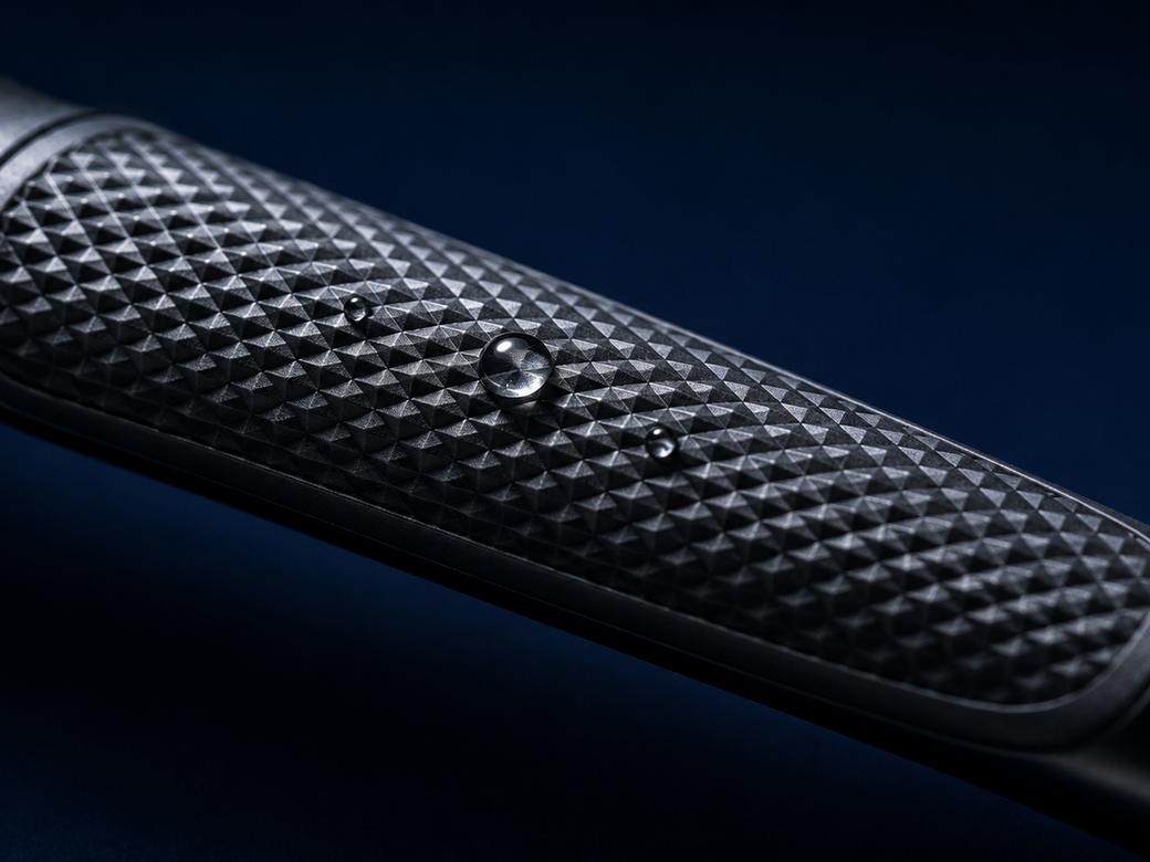 Macro view of the diamond-knurled grip texture